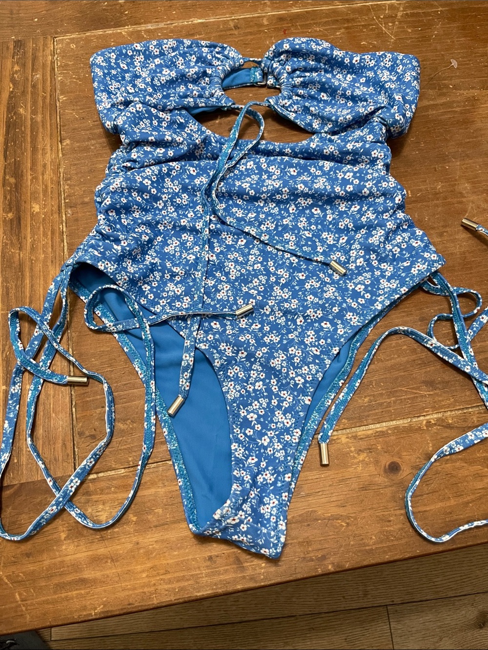 Blue Floral Ruched One-Piece Swimsuit with Adjustable Ties